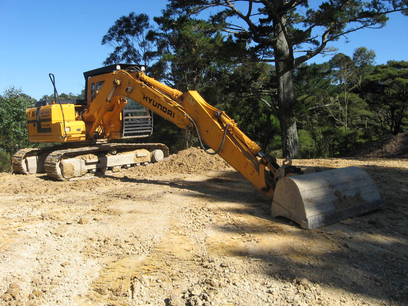 An excavator performing site preperation